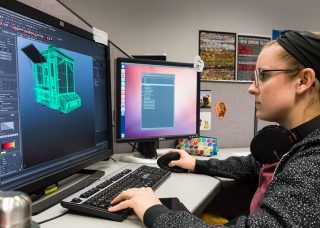Student creates a digital rendering in the viz lab