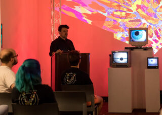MFA student presents his body of work at an art gallery