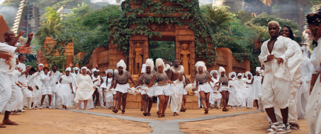 A funeral procession scene from the movie "Black Panther: Wakanda Forever."