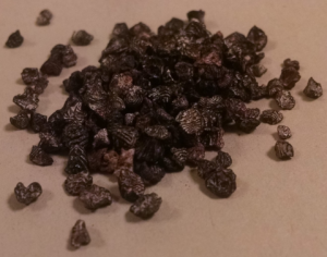 A pile of dried cochineal insects, which are used in dyeing textiles.