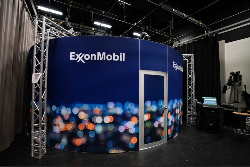 The exterior of a circular room that inside houses a 360-degree screen. An ExxonMobil logo is visible on the exterior.