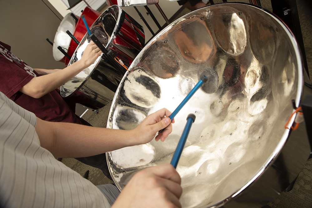 Performers play steel drums