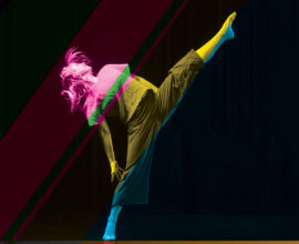 A dancer performs, with her left leg extended upward. Colors — pink, green, yellow and blue — are overlaid over the image.